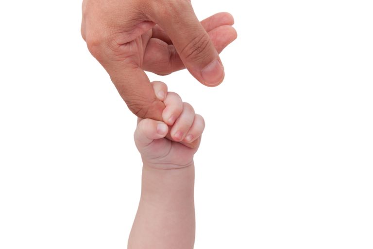 Bild Kinderhand umfasst Finger